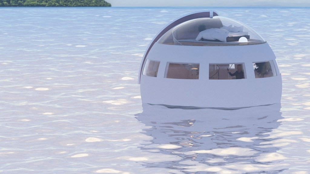 Atteindre une île d’attractions dans une capsule flottante